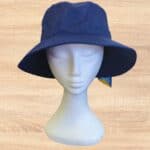 Wide brim navy blue sun hat on model
