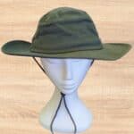 Wide brim green hat on model